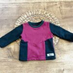 Babypullover in grün-pink